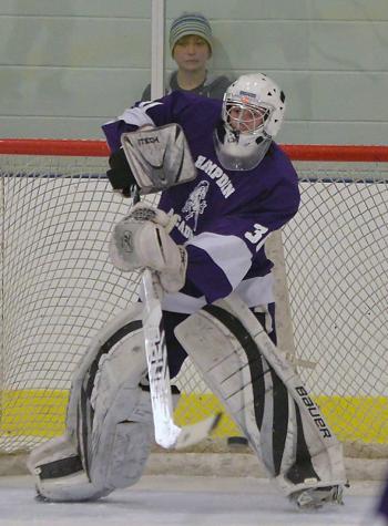Hampden goalie Cody Varney makes a nice save on this shot. (Photo by Ron Hawkes)