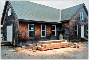 BELFAST - Freshly cut timbers outside the former Belfast Boatyard offices. The property sold in September to the adjacent Front Street Shipyard.