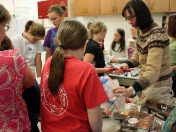 Students sort through the candy decoration options. (Photo by Holly S. Edwards)