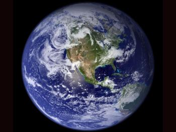 This “blue marble” image, courtesy of NASA, is the most detailed true-color image of the entire Earth to date. Using a collection of satellite-based observations, scientists and visualizers stitched together months of observations of the land surface, oceans, sea ice, and clouds into a true-color mosaic of every square kilometer (.386 square mile) of the planet. Much of the information contained in this image came from a single remote-sensing device-NASA’s Moderate Resolution Imaging Spectroradiometer (MODIS). Onboard the Terra satellite, MODIS observes a variety of terrestrial, oceanic, and atmospheric features of the Earth. (Courtesy of NASA Goddard Space Flight Center)
