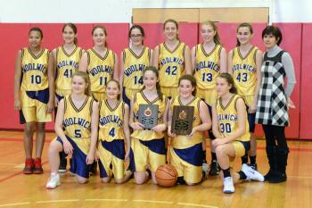 Small School champion Woolwich pose for a photo after the game. The Wildcats defeated Vinalhaven 48-28. (Photo by Ron Hawkes)