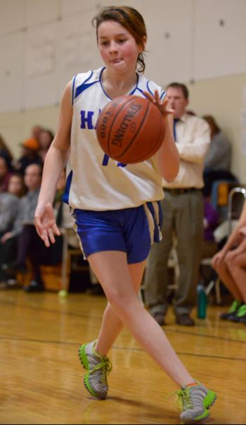 Hope's Kaitlynn Turnbull drive;s to the basket. (Photo by Ron Hawkes)