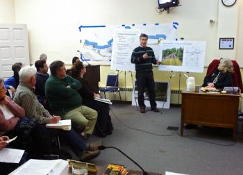 Greg Bakos of VHB Engineering presents the results of a rail trail feasibility study to the City Council, Jan. 15. (Photo by Ethan Andrews)