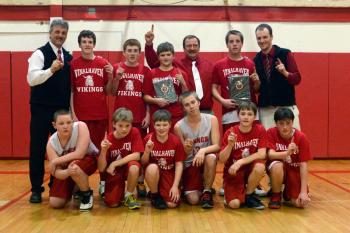 The Small School champions of Vinalhaven pose for a team photo after the game. The Vikings beat Woolwich 63-59. (Photo by Ron Hawkes)