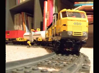 "Yet rarely had I been so content as I was then, watching our little train whizz around its circular route."