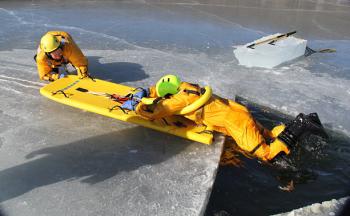 Pulling the line from shore and the victim slips out of the water, ever so gracefully. (Courtesy Rockland FD/by Alan Athearn)