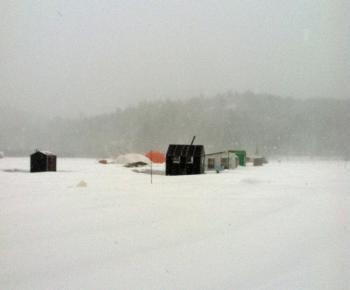 The cover of one of the three domes on Hosmer Pond in Tobogganville was lost overnight in the high winds. (Photo by Andrew Dailey)