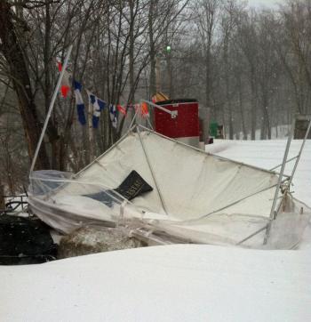 A vender tent broke and flipped overnight Friday in the blizzard. (Photo by Andrew Dailey)