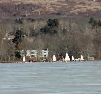 Last week's rain and thaw, followed by two nights of below-freezing temperatures made for perfect ice boat conditions on Chickawaukie Pond Saturday. (Photo by Holly S. Edwards)