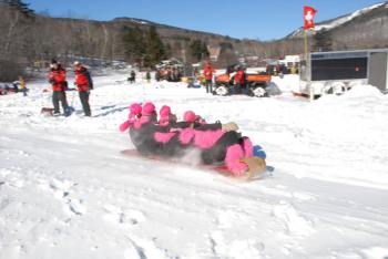 A lot of pink on that 4-person sled. (Courtesy Snow Bowl/by Dave Ridley)