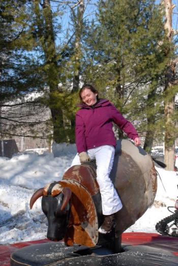 The mechanical bull proved to be a popular side attraction again this year. (Courtesy Snow Bowl/by Dave Ridley)