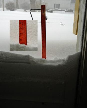 An unofficial measurement at 9:30 a.m. Saturday shows 21 inches of snow on Chestnut Street in Camden. (Photo by Holly S. Edwards)