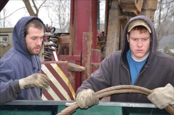 Chris Eustis and Justin Henry work for Arthur D. Henry Crane Service, of Thomaston. (Photo by Lynda Clancy)