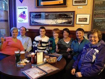 Raising pints of all manner of beverages at Rollie's in Belfast in support of the P.A.W.S. Animal Adoption Center.