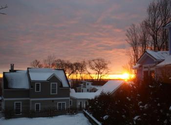 According to the Library of Congress, a red sunrise reflects the dust particles of a system that has just passed from the west. This indicates that a storm system may be moving to the east. If the morning sky is a deep fiery red, it means a high water content in the atmosphere. So, rain is on its way. The sunrise in Camden was bright and vibrant this morning, casting pink into the bands of clouds above. Another storm is due to arrive tomorrow. (Photo by Holly S. Edwards)
