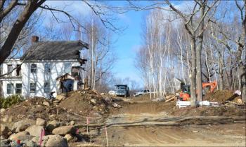 Ted Skowronski's house, on Commercial Street in Rockport, was demolished at the end of January. The cutting of trees in November there is now the subject of a lawsuit. (Photo by Lynda Clancy)