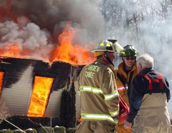 Rockport Fire Chief Bruce Woodward, right, attends one more fire before he is set to retire in three days. (Photo by Holly S. Edwards)