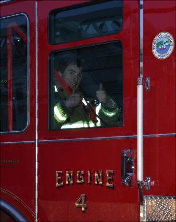 Off to another call, but just a fire alarm, and Engine 4 was quickly back at the scene. (Photo by Lynda Clancy)