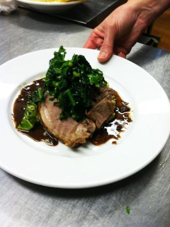 Roasted lamb on cedar boughs with potatoes dauphinoise. (Courtesy Ladleah Dunn)