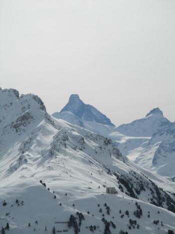 "A thick mat of somber clouds hung in the sky, but we could still see the Matterhorn, a black humpbacked fang framed between two distant peaks."