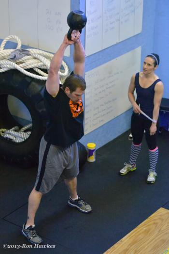 Scott Herrick works the kettlebell as he progresses through his workout. (Photo by Ron Hawkes)