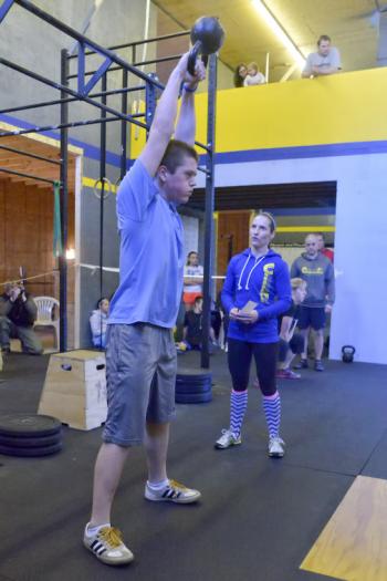 Sam Townsend works the kettlebell as he progresses through his WOD. (Photo by Ron Hawkes)