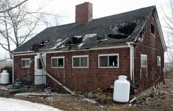 A fire at 152 Marrs Hill Road in Union, just after midnight Friday, caused extensive damage to the home and its contents and will likely need to be torn down, according to Union Fire Chief Barry Norris Saturday. (Photo by Holly S. Edwards)