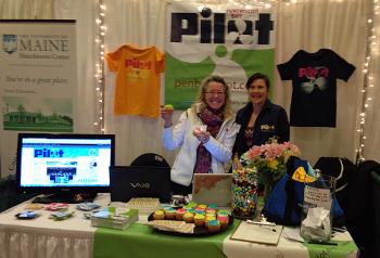 Holly S. Edwards and Janis Bunting at the Penobscot Bay Pilot booth at the Penobscot Bay Regional Chamber of Commerce Business and Community Expo in Rockport today. (Photo by Lynda Clancy)
