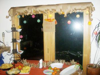 Some paper bags for thatched roof, some strung up lights, there you go...cheap as it gets. (Photo by Kay Stephens)