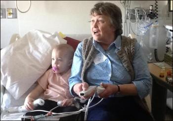 Andy O'Brien teaches his grandmother, Diane, how to play Mario Kart. (Photo courtesy of the O'Briens)