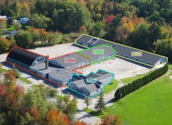 The former Rockport Elementary School as it stood in 2011. Rockport resident Richard Remsen shot this photo of the school, and then delineated the four sections that were constructed, or assembled, in various decades since 1954. (Photo by Richard Remsen)