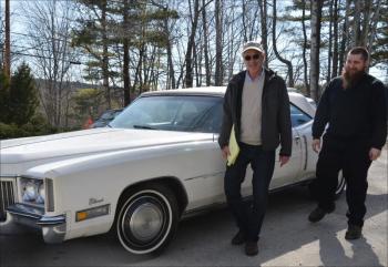 James Landi, of Maryland and Camden, has Rockport Automotive Technician Dennis Emery II evaluate his 1972 Cadillac El Dorado before it is shipped to its new owner in Texas. (Photo by Lynda Clancy)