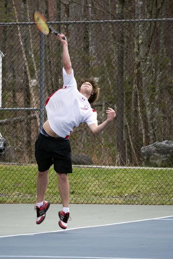 Camden Hills Marc Balley serving in the number 2 singles match.(Photo Courtesy of Dwight Pitcairn)
