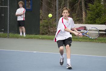 Camden Hills Luke Burstien return a shot in the number 3 singles match(Photo Courtesy of Dwight Pitcairn)