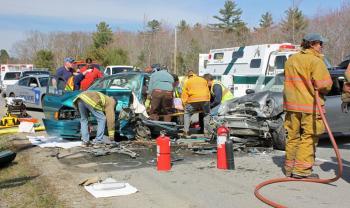 A Ford Escort station wagon being driven by Terry Ripley of Northport and a Mini Cooper being driven by Thomas Tarbox of Camden crashed on Route 1 in Rockport Monday afternoon, sending three to the hospital. (Photo by Holly S. Edwards)