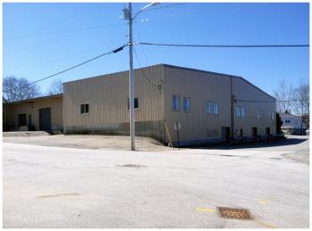 Belfast-based window manufacturer Mathews Bros. opted not to pursue a Community Development Block Grant through the city to expand its Perkins Road facility, but plans to reoccupy its long vacant downtown building, pictured. Maine Maritime Products also withdrew its bid for state grant funding. (Photo by Ethan Andrews)