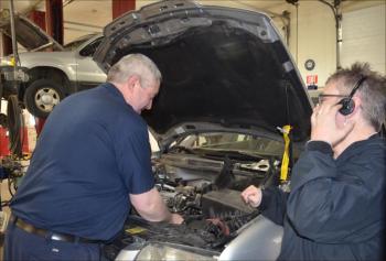 Eric and Jan Campbell, new owners of Rockport Automotive. While Eric works on the vehicles, Jan works the phones, and the business. (Photo by Lynda Clancy)