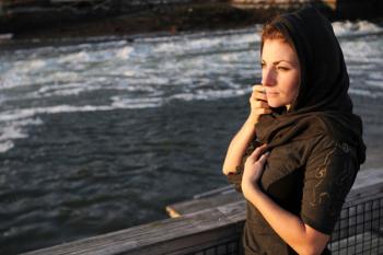 Daria Norvlaan modeing her own off black fine gauze tencel scarf. Courtesy Erin Little