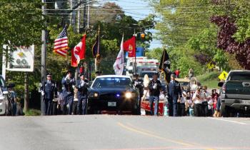 The Memorial Day parade enters downtown Camden May 27. (Photo by Holly S. Edwards)