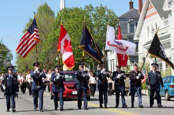 The color guard leads the parade into Camden Memorial Day, May 27. (Photo by Holly S. Edwards)