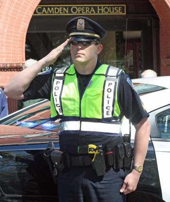 Camden Police Sgt. Pat Polky, also a master sergeant with the Maine Army National Guard, during a pause in Monday's Memorial Day parade at the honor roll. (Photo by Holly S. Edwards)