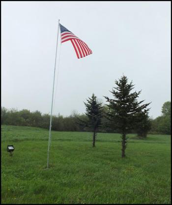 A flag flies from the original site of the 4th Maine Regiment