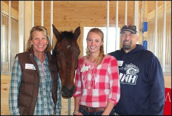 Farm manager Erin Judkins (Center) with her parents Priscilla and Wayne.