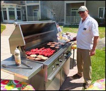 Mike Fletcher mans the grill.