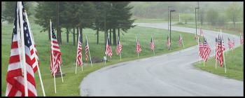 American flags line the drive to Rockland's American Legion Post #1