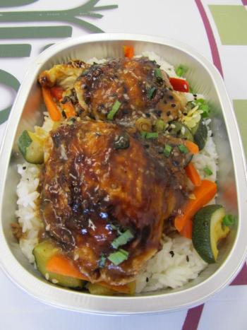 Asian barbequed chicken over jasmine rice. Photo by Kay Stephens
