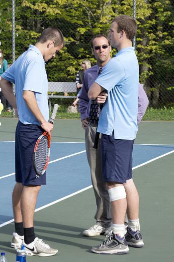 Oceanside's Luke Rector and Tyler Gilson gets some words of encouragement from coach Shawn Dulac. (Photo Curtesy of Dwight Pitcarin)