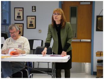 Troy Howard Middle School art teacher Lynette Sproch appeals to the RSU 20 board for the value of visual art, which would be effectively eliminated in the school next year if her position is cut as planned in the current budget. (Photo by Ethan Andrews)
