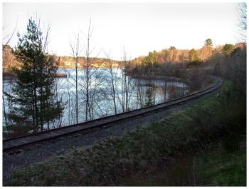 A portion of the city-owned rail corridor just north of the old Upper Bridge that would be converted to a walking and biking trail. (Photo by Ethan Andrews)