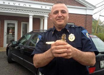 Camden Police Chief Randy Gagne and a new friend. (Courtesy Steve Pixley)